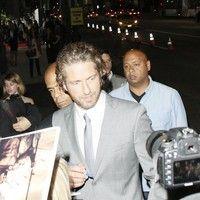 Gerard Butler signs autographs for fans at the 'Machine Gun Preacher' premiere | Picture 84215